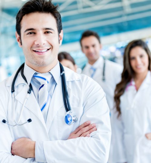 bigstock-Man-leading-a-group-of-doctors-51365755